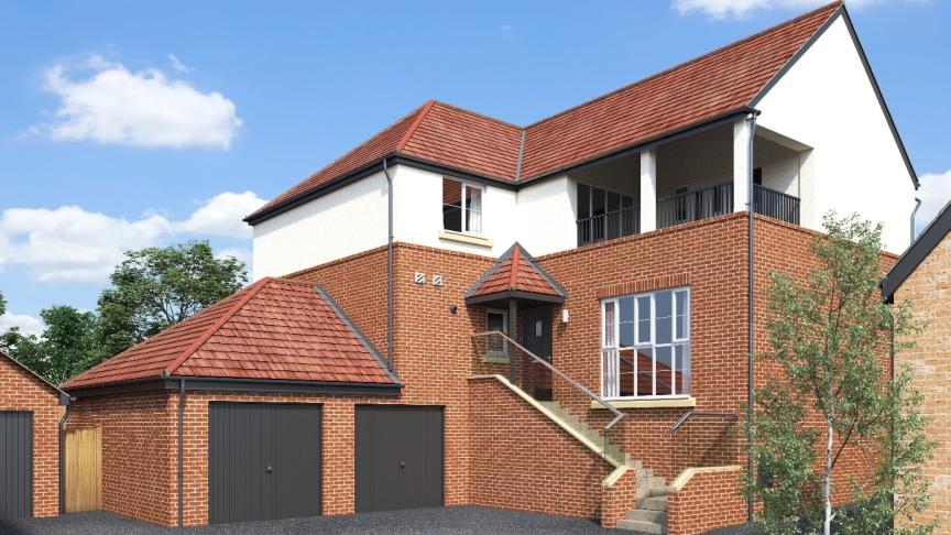 Exterior of a large house with terrace, driveway and double garage